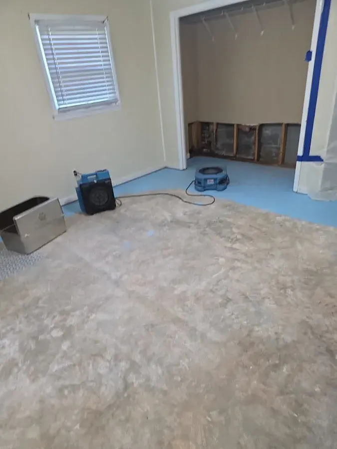 Drying a room after the flooring was removed in Rowan County